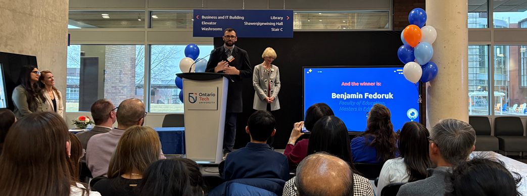 Benjamin Fedoruk receiving an award at Ontario Tech University